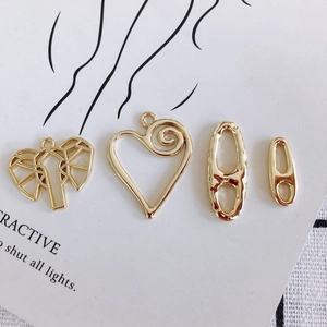 Gouden DIY-bedelset met origami-olifant, hart en ovale hangers voor het maken van sieraden