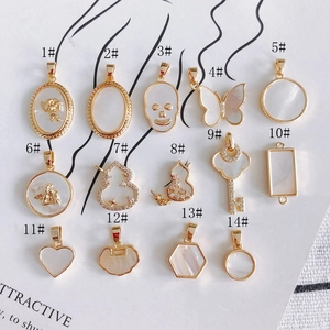 18k gold plated brass shell pendants in butterfly, skull, and gourd shapes for DIY jewelry