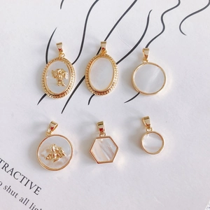 DIY 18k gold plated shell pendants featuring angel embossments and geometric shapes