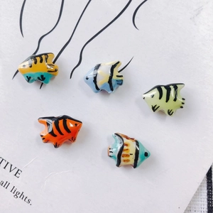 Set of five colorful handmade ceramic fish beads with glazed finish for DIY jewelry