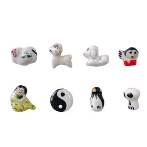 Set of 8 cute hand-painted ceramic charms featuring sheep, puppy, penguin and skull designs