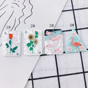 Set de dijes acrílicos DIY con diseños de rosa girasol y flamenco para joyería artesanal