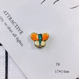 Macro shot of 17x14mm colorful butterfly ceramic bead for DIY jewelry making
