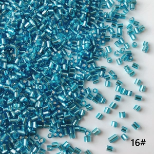 Close-up of 2mm bright blue silver-lined glass tube beads for DIY jewelry making