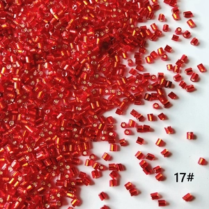 Detailed view of 2mm bright red bugle beads for DIY jewelry and beaded handicrafts