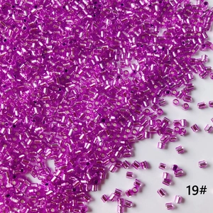 Macro shot of 2mm purple silver-lined glass bugle beads for DIY jewelry making color 19#