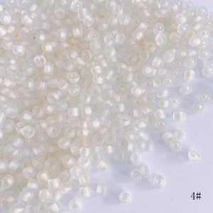 Macro shot of 4mm frosted translucent AB seed beads for DIY jewelry making