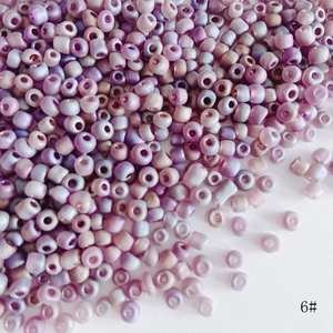 Detailed macro view of 4mm frosted purple beads for handmade jewelry making and DIY projects