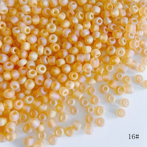 Close-up of 4mm frosted orange seed beads for DIY jewelry making with matte finish and 16# code