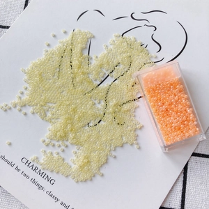High-quality 2mm cream jade glass seed beads in pale yellow and orange for DIY jewelry crafts