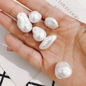 Handheld cream white irregular baroque pearls with iridescent luster for DIY jewelry