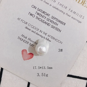 Macro shot of a 17.5x13.5mm cream white baroque pearl bead for DIY jewelry making