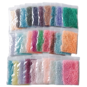 Colorful 2mm glass seed beads sorted in clear bags for DIY jewelry making accessories