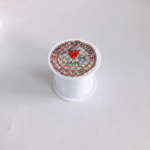 Detailed view of 0.5mm transparent non-elastic beading wire roll for jewelry making