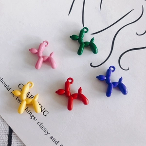 Colorful balloon dog charms in pink, green, yellow, and blue for DIY jewelry making