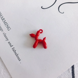 Glossy red balloon dog charm with metallic ring for DIY jewelry making and crafts