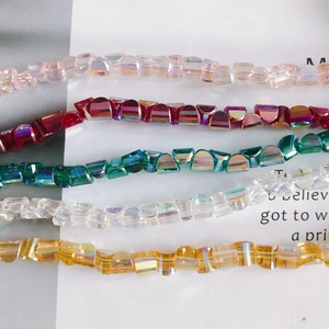 Faceted multi-colored crystal glass beads in pink green and gold for DIY jewelry making