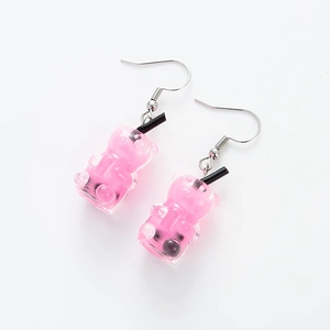 Pink gummy bear drink bottle earrings with straw detail and silver metal hooks