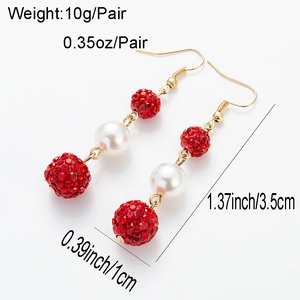 Detail view of cherry-shaped drop earrings with red crystal balls and white pearls