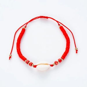 Handmade red shell bracelet with woven cord and adjustable closure for girls and women