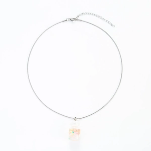 Minimalist silver snake chain necklace with a colorful drifting bottle glass pendant