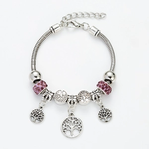 Silver snake chain charm bracelet with purple crystals and tree of life pendants