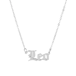 Detailed view of silver Leo zodiac pendant necklace in Old English font on white background