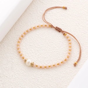 Handgefertigtes Perlenarmband mit matten rosa Perlen und verstellbarer Schnur für Damen
