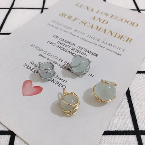 Ciondoli in opale avvolti in filo d'oro e argento per la creazione di gioielli fai-da-te