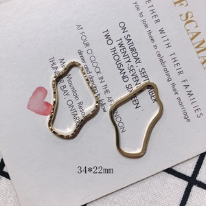 Detail of 34x22mm gold irregular hollow metal charms for DIY jewelry making