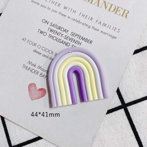 Macro shot of 44x41mm pastel rainbow DIY craft resin accessory for handmade jewelry