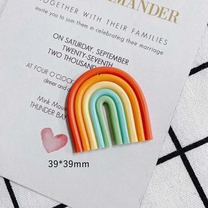 Macro shot of 39x39mm colorful clay rainbow charm for DIY crafts and accessories