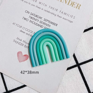 Detailed view of handmade DIY rainbow charm in mint green tones, size 42x38mm