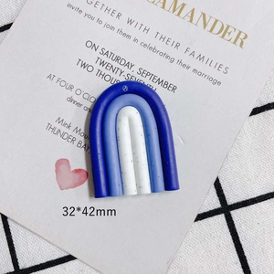 Macro detail of U-shaped rainbow resin DIY accessory with 32x42mm size markings