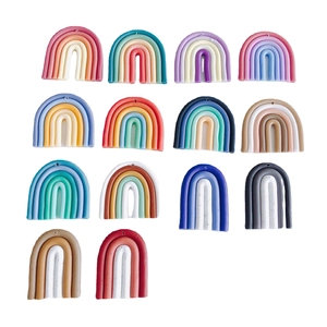 DIY colorful clay rainbow charms for jewelry making with multiple bright pastel shades