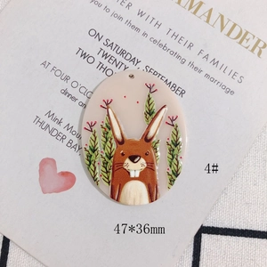 Detail of 47x36mm oval acrylic rabbit pendant with green leaves for DIY handmade jewelry