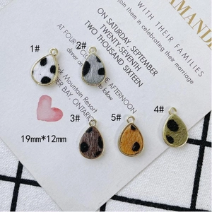 Plush waterdrop charms with animal print textures and gold metal frames for DIY jewelry