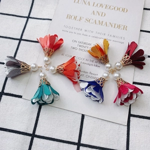 Detailed set of handmade fabric flower pendants with pearls and golden caps for DIY jewelry