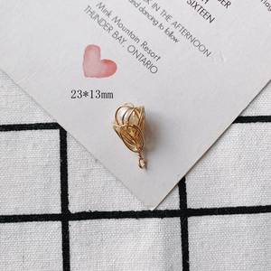 Detail of 23x13mm gold wire-wrapped pearl pendant charm for DIY jewelry making