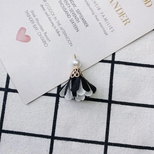 Detail of DIY fabric flower charm with white pearl and golden ring for earring making