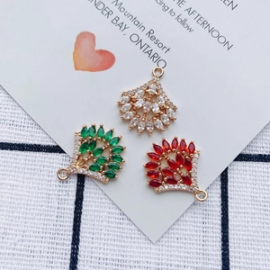 Fan-shaped alloy pendant charms with marquise cut stones and rhinestone accents in three colors