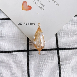 Detailed view of wire-wrapped water drop pearl pendant with 35.5x14mm size marking