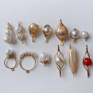 Detailed collection of handmade gold-wired pearl pendants for DIY jewelry crafting