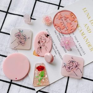 Pink acrylic pendants with vintage female portraits and floral designs for DIY jewelry