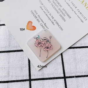 Detail view of 42mm pink floral relief acrylic pendant for DIY jewelry making