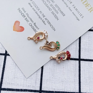 Three peacock-shaped alloy pendants with colorful gemstones for DIY jewelry making