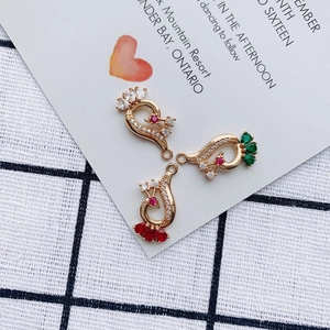 Three peacock crystal charms in gold alloy with zircon inlay for DIY jewelry making
