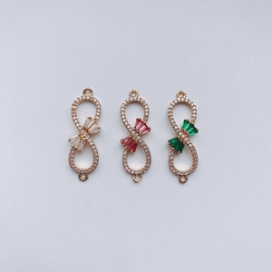 Infinity jewelry connector in rose gold with pave crystals and rectangular gems
