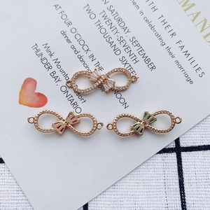 Infinity loop alloy charms with sparkling zircons and enamel for DIY jewelry making