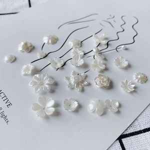 DIY pearl white acrylic flower beads in various floral shapes for handmade jewelry